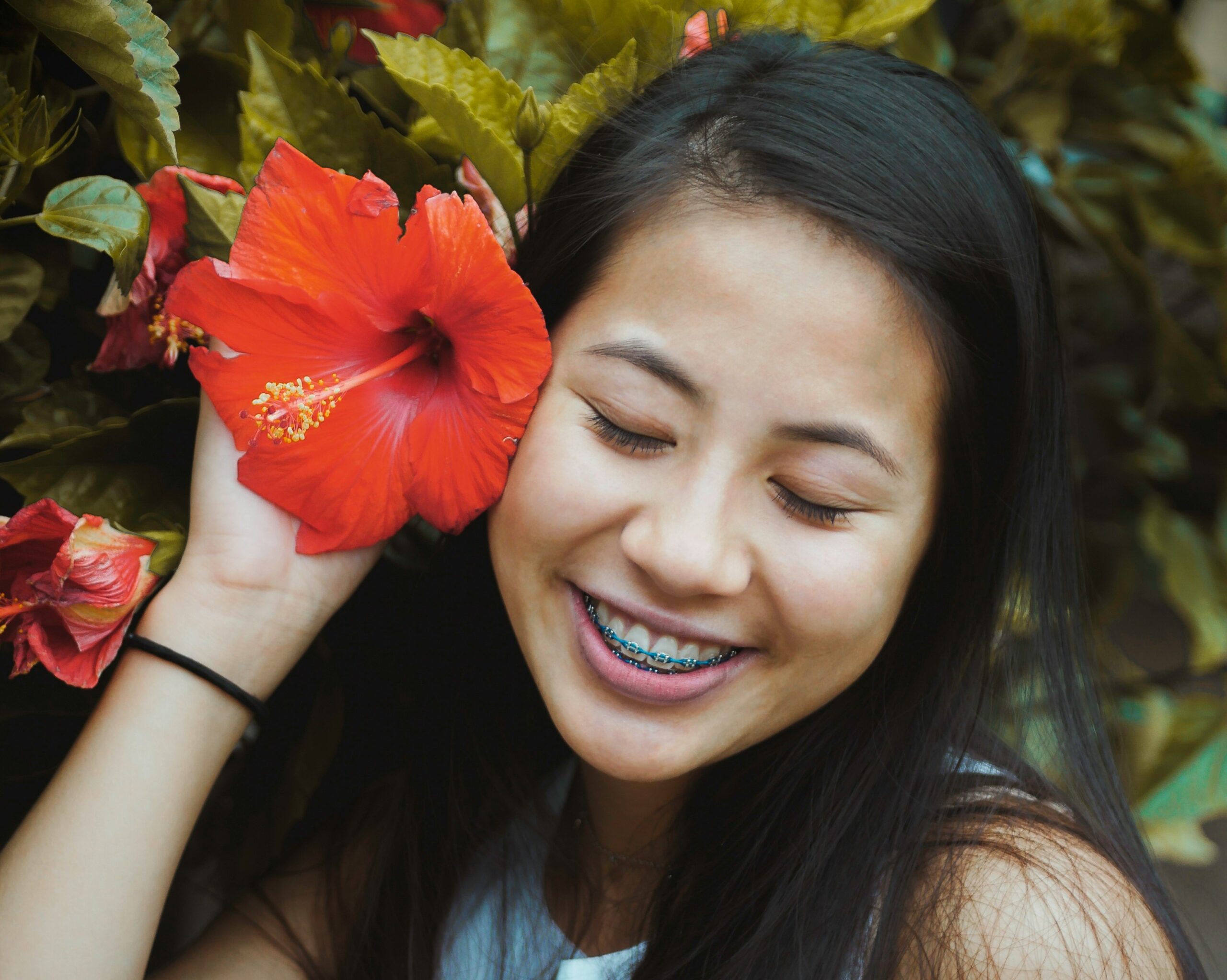 Girl smiling with braces.